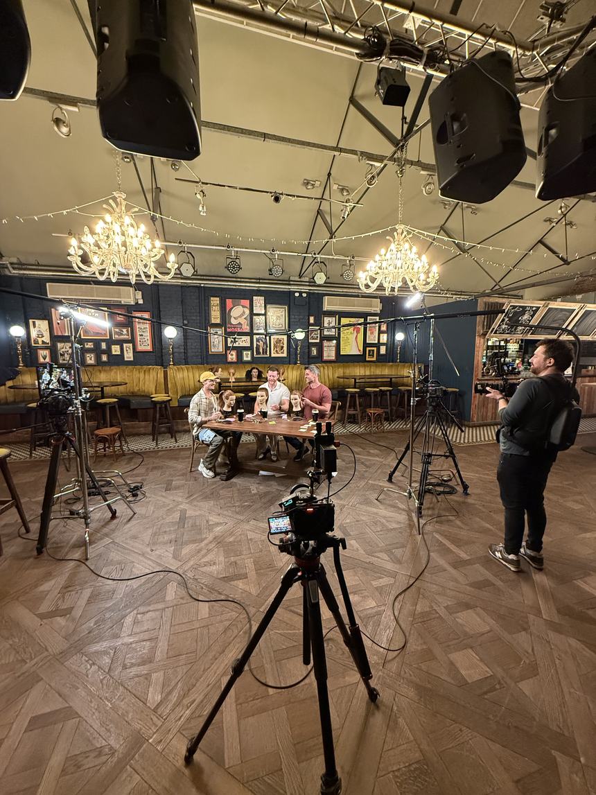 The pub function room dressed for the shoot, chandeliers overhead