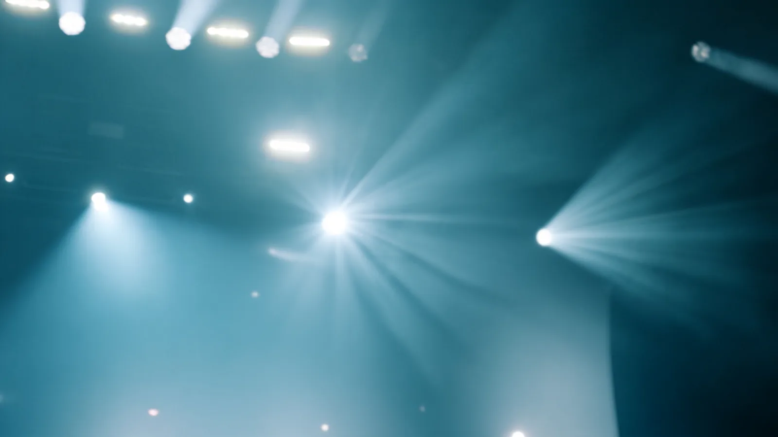 Sam Ryder performing under the lighting rig at Wembley Arena